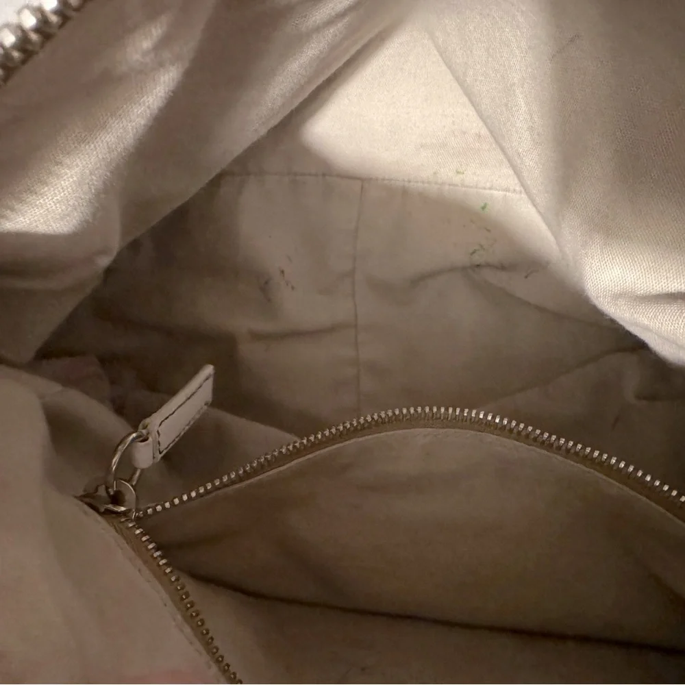 Vintage Miu Miu white leather hobo bag in excellent used condition.